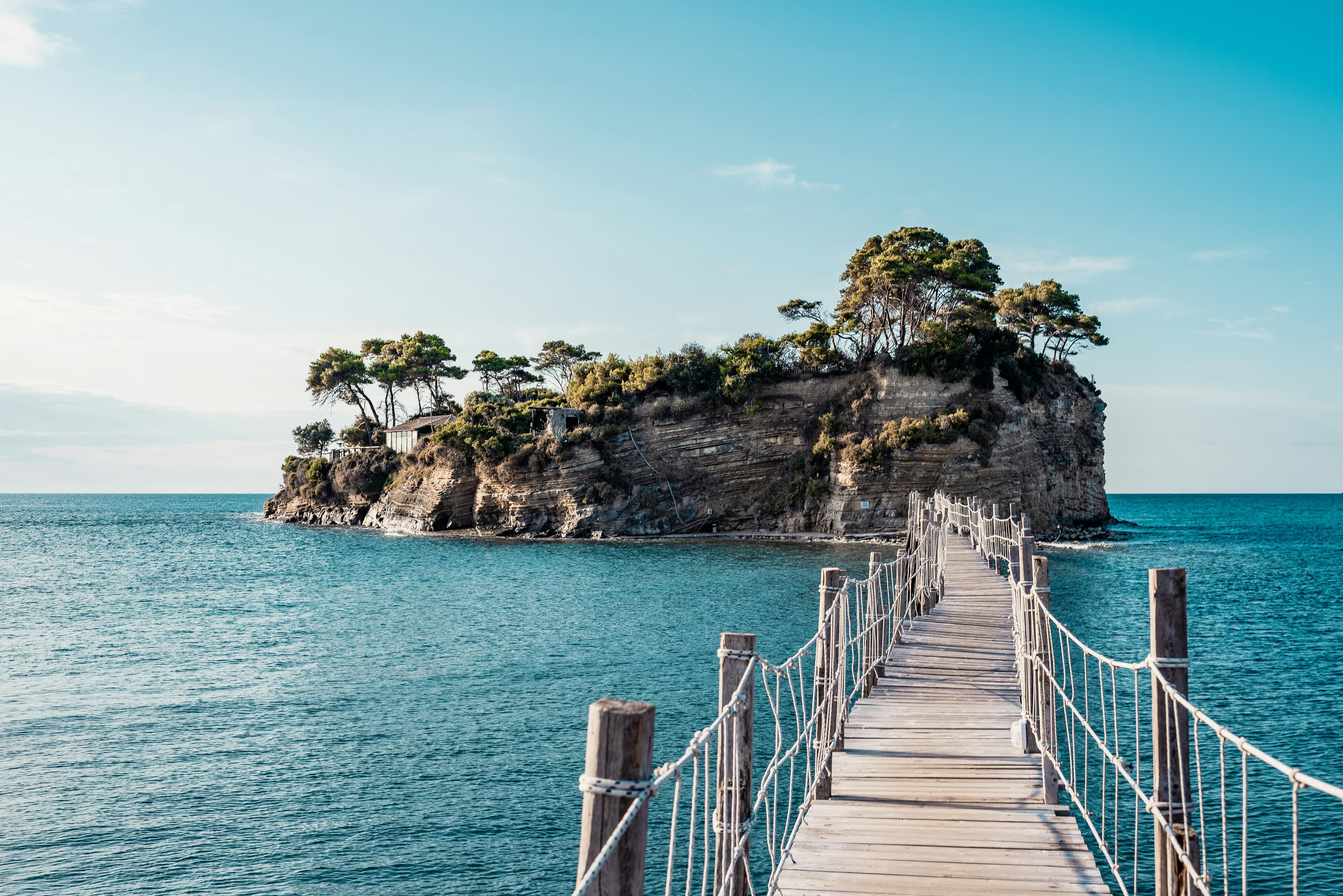 Wooden bridge leading to a small island